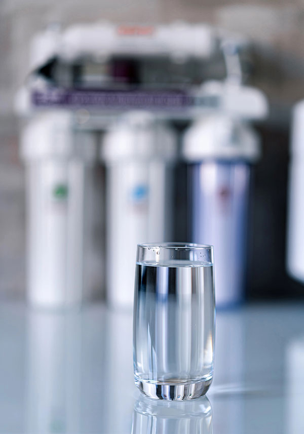 Clean Glass of Water with Filter Background