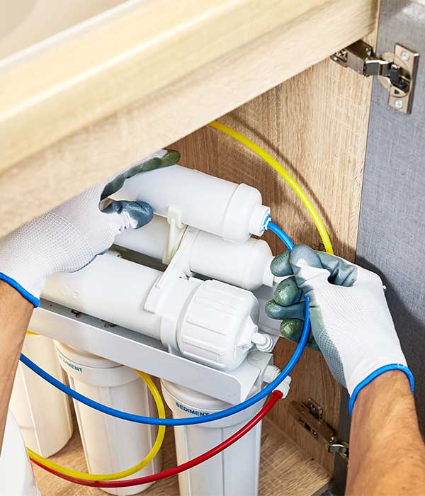 Technician replacing Water Filter